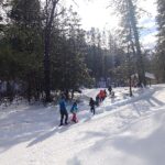 kids hiking in the snow