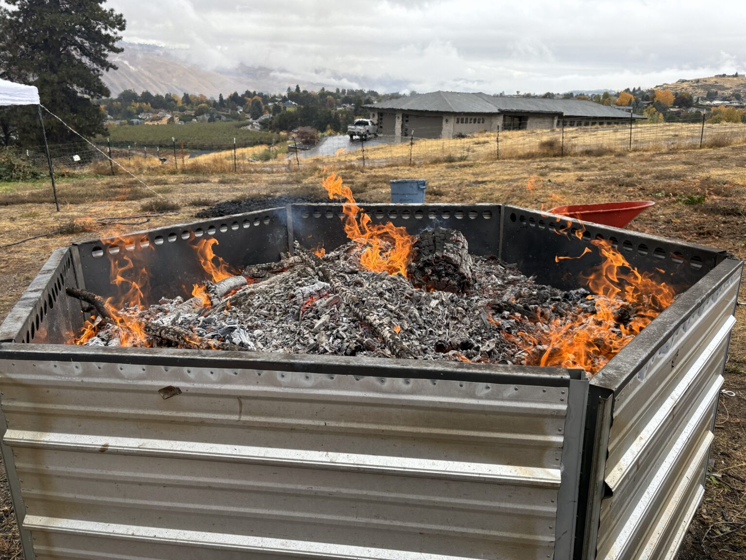 Photo of biochar on fire