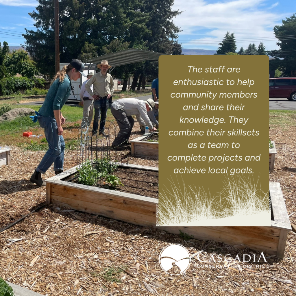 Marcy (Ag and Farm Team) and Mark (Riparian Team) are installing drip irrigation system at a local community garden.